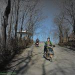 Steppenfuchs Reisen - Nordkorea - Motorroller auf der Landstrasse